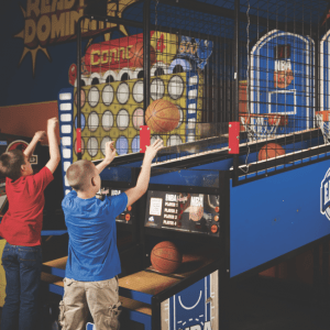 Two Kid playing Basketball Arcade