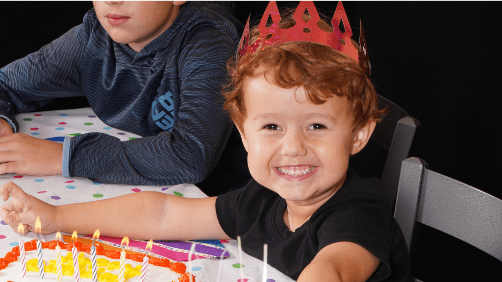 A young boy enjoying his birthday celebration in Mr. Gatti’s Pizza franchisees with the pizza franchise opportunity and hometown pizza franchise.