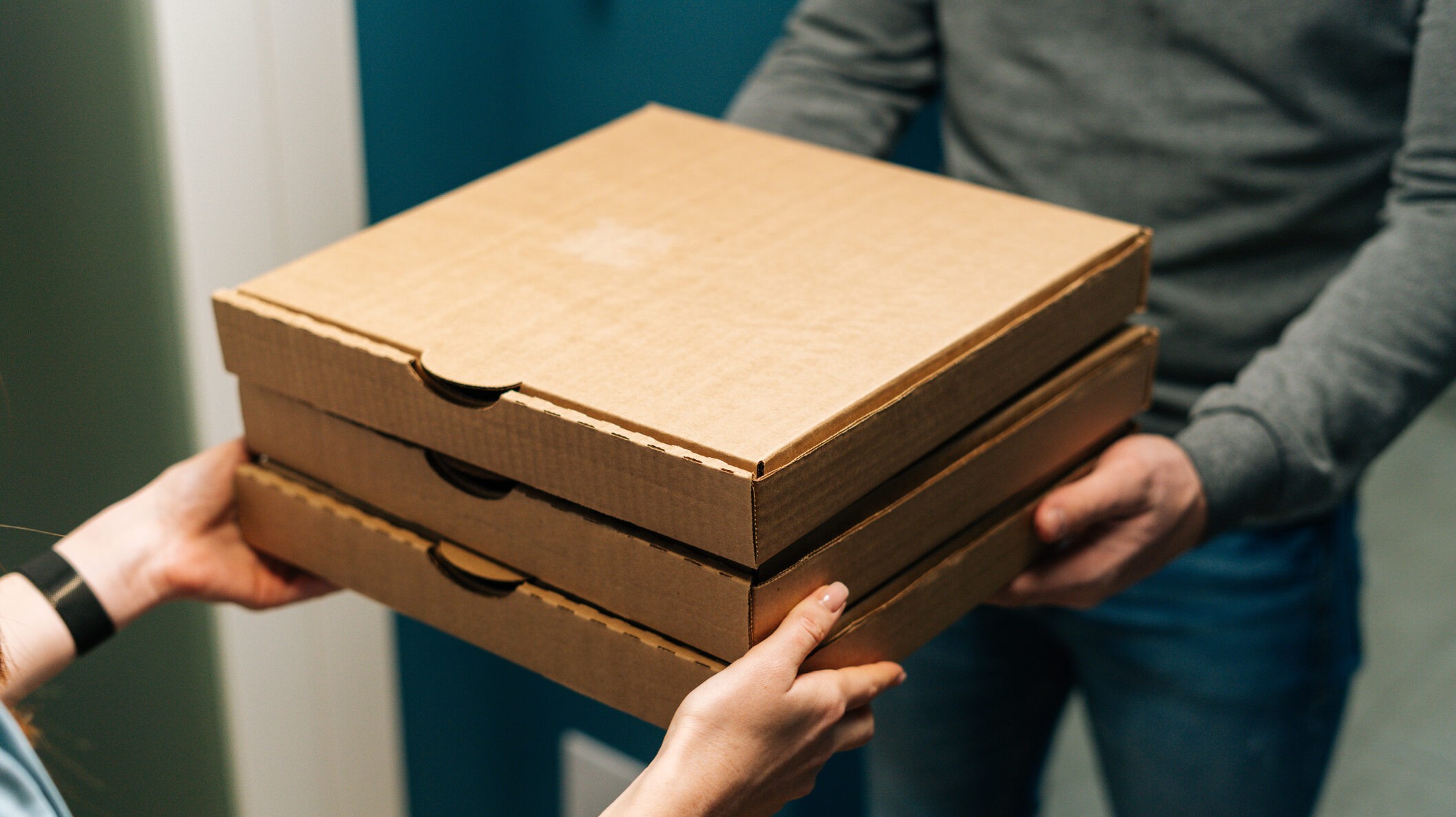 Boxes of pizza in Mr. Gatti's Pizza Franchise serve up delicious pizza and deliver memorable experiences to families and communities with the pizza franchise business and family entertainment center.
